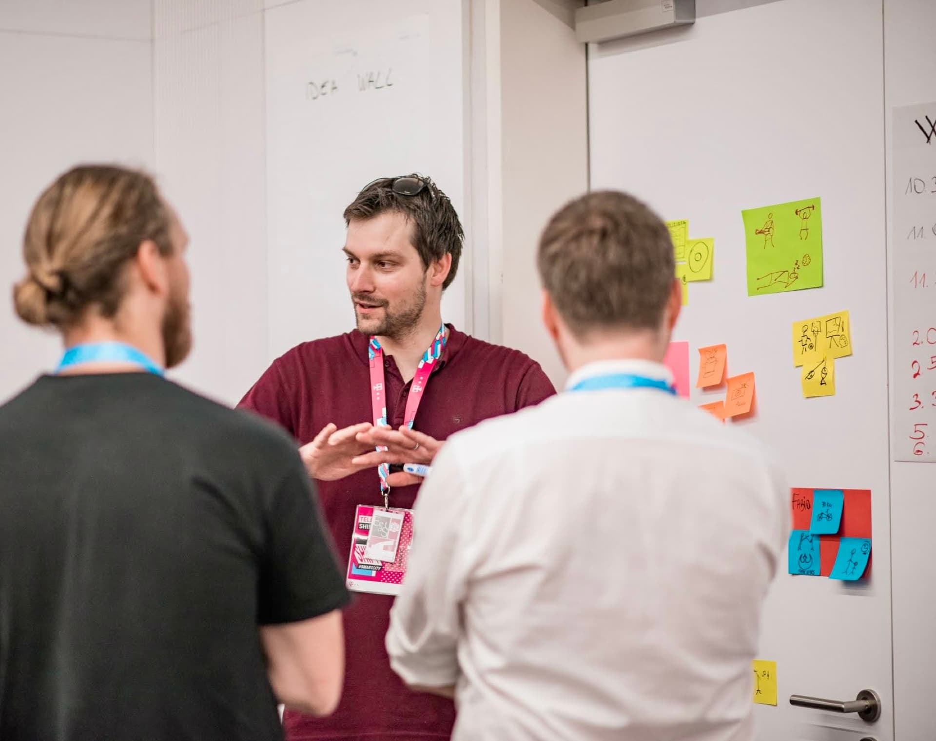 Ivan in conversation with participants during a facilitated session